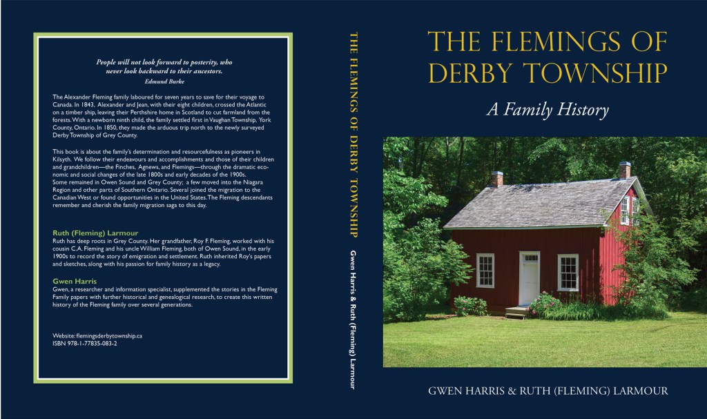 Image of the back and front of the book cover. Front shows the board and batten Springfield House.